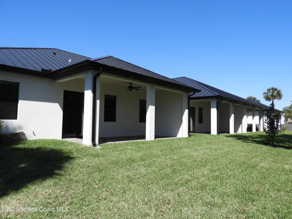 a house view with a garden space