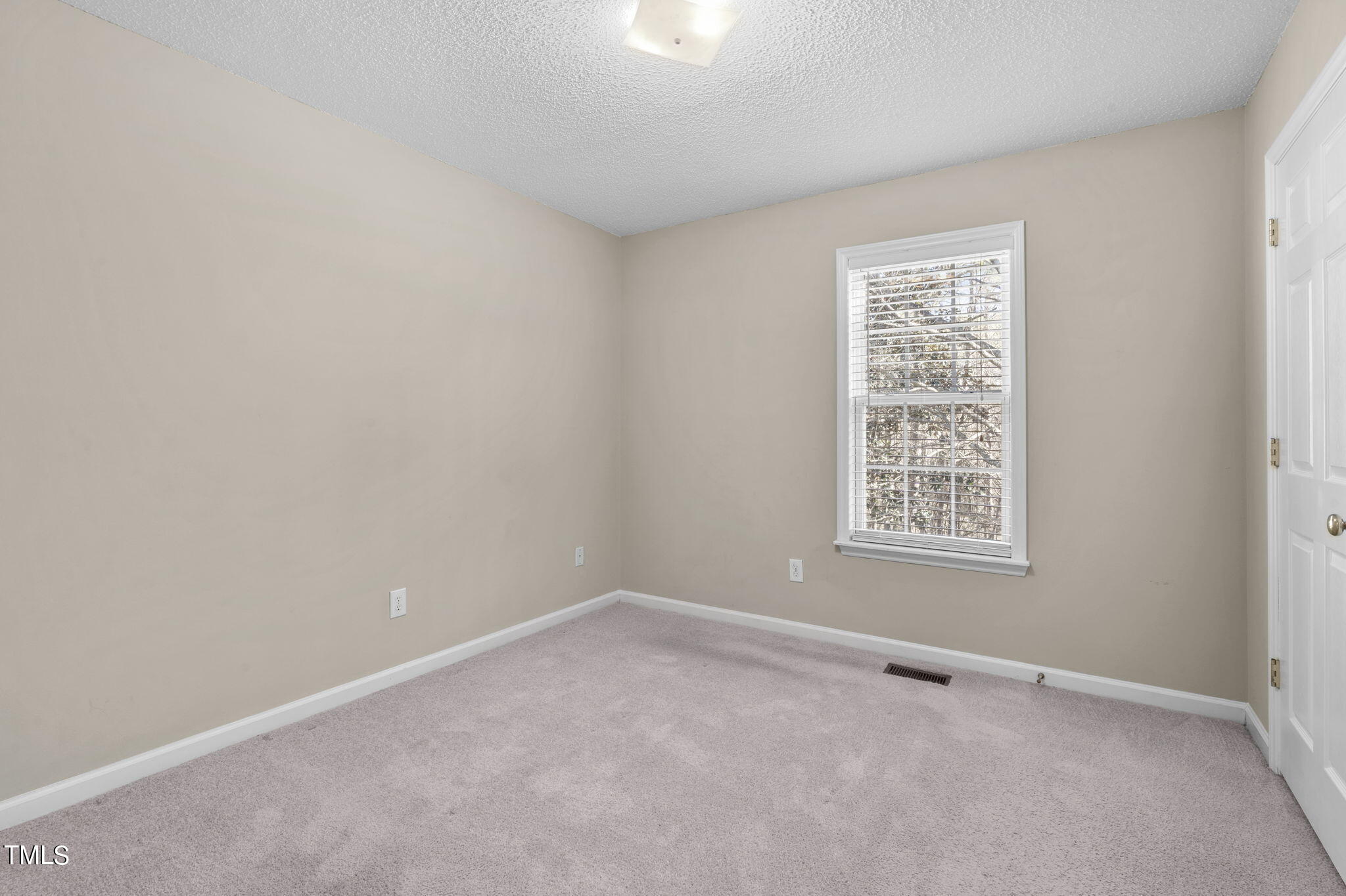 7320 Bonnie Ridge Court Raleigh, NC 27615 - Photo 22 of 29 Bedroom 3