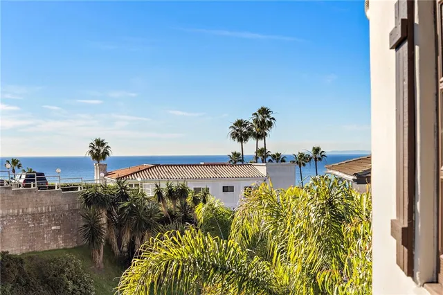a view of a swimming pool with a yard