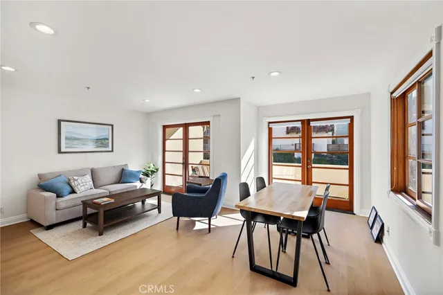 a living room with furniture and windows