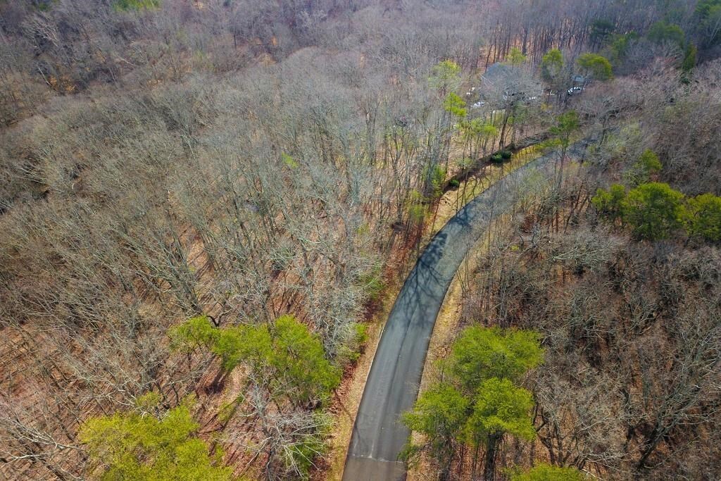 26 Outback Road Jasper, GA 30143 - Photo 1 of 1 Gorgeous treelined winding roads throughout community.