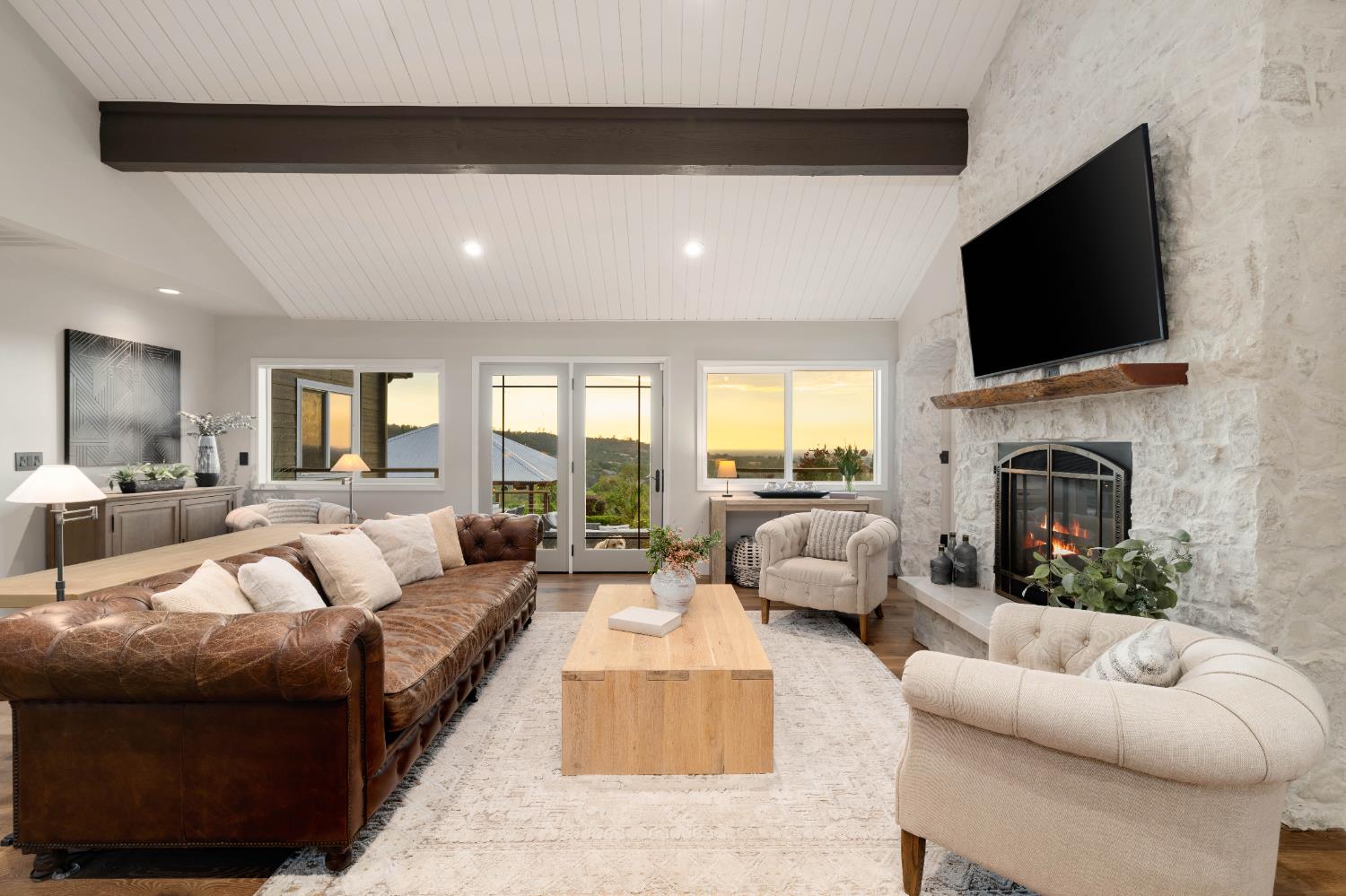 7380 Ridge Road Newcastle, CA 95658 - Photo 11 of 89 a living room with furniture a fireplace and a flat screen tv
