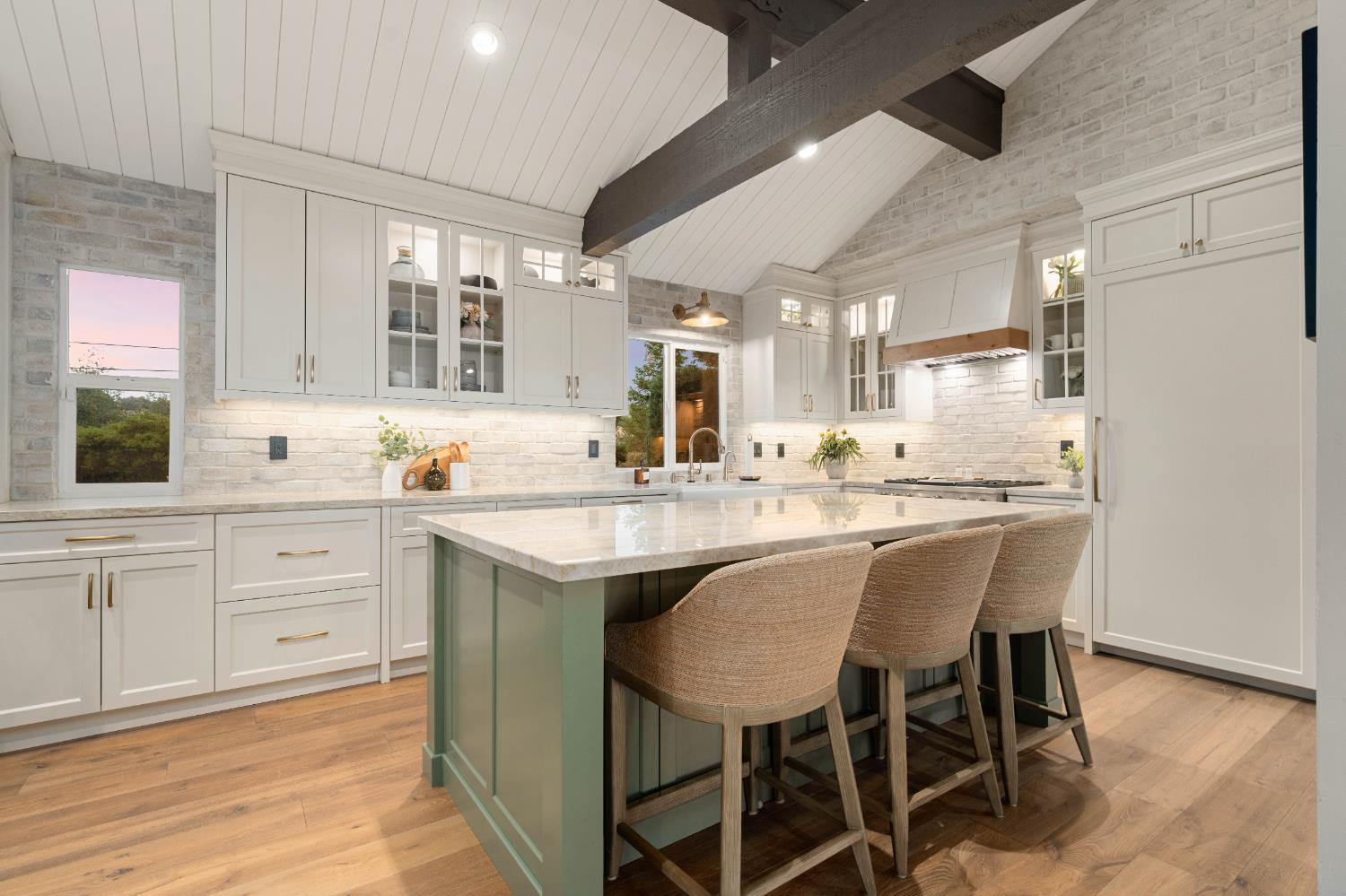 7380 Ridge Road Newcastle, CA 95658 - Photo 16 of 89 a kitchen with stainless steel appliances granite countertop a table chairs sink and cabinets