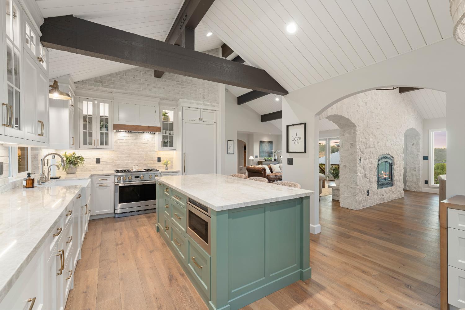 7380 Ridge Road Newcastle, CA 95658 - Photo 18 of 89 a large kitchen with stainless steel appliances kitchen island a stove and a sink