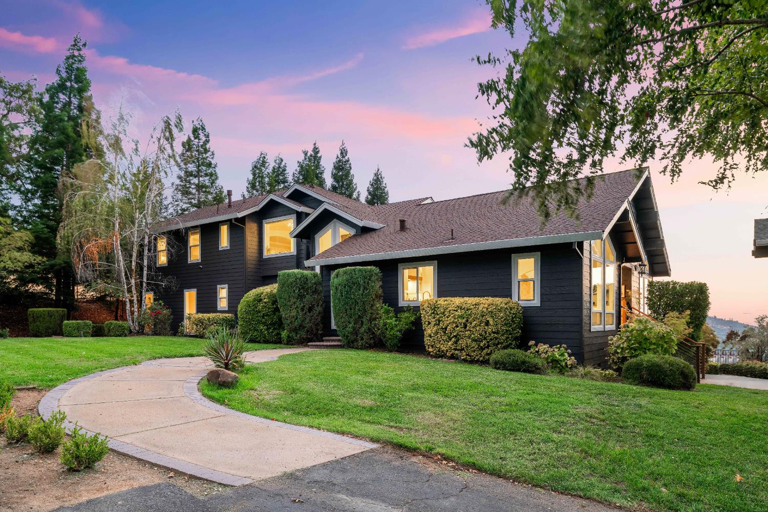 7380 Ridge Road Newcastle, CA 95658 - Photo 2 of 89 a front view of a house with a garden