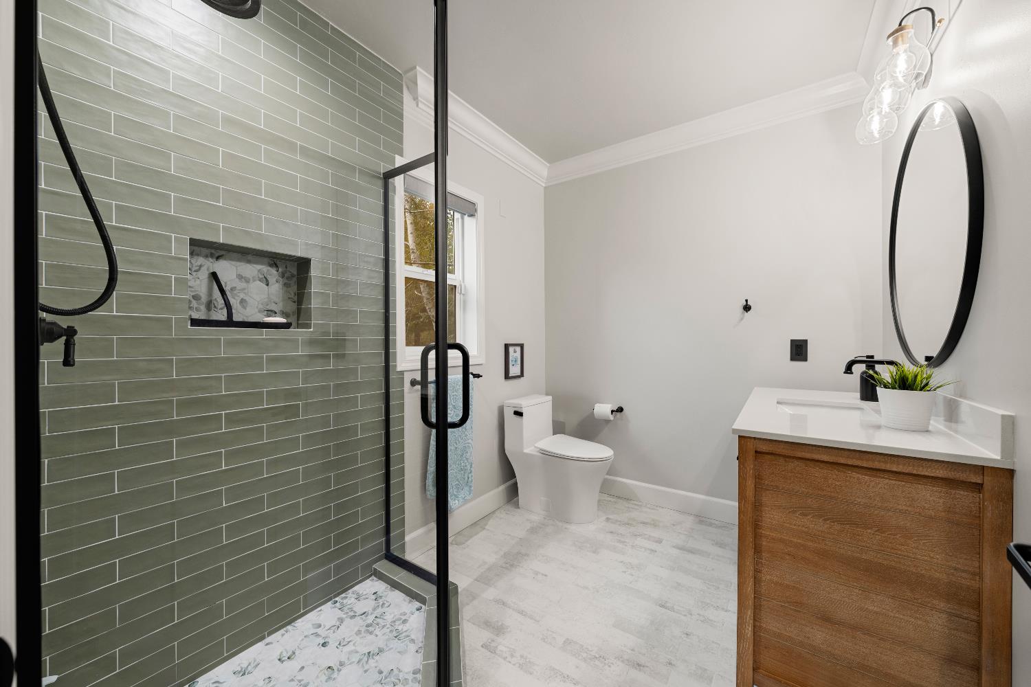 7380 Ridge Road Newcastle, CA 95658 - Photo 33 of 89 a bathroom with a toilet sink and mirror