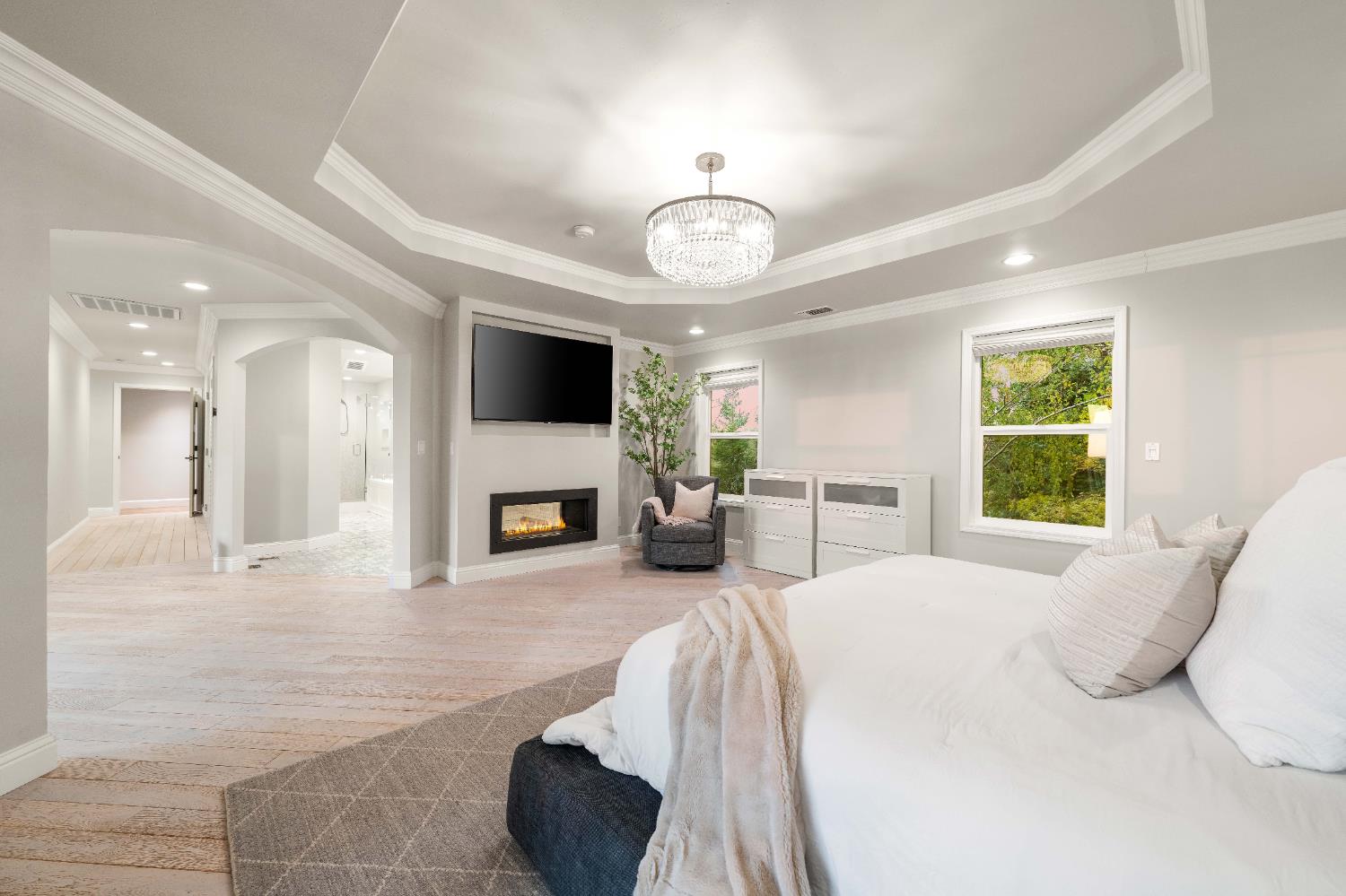 7380 Ridge Road Newcastle, CA 95658 - Photo 43 of 89 a spacious bedroom with a bed and a flat screen tv