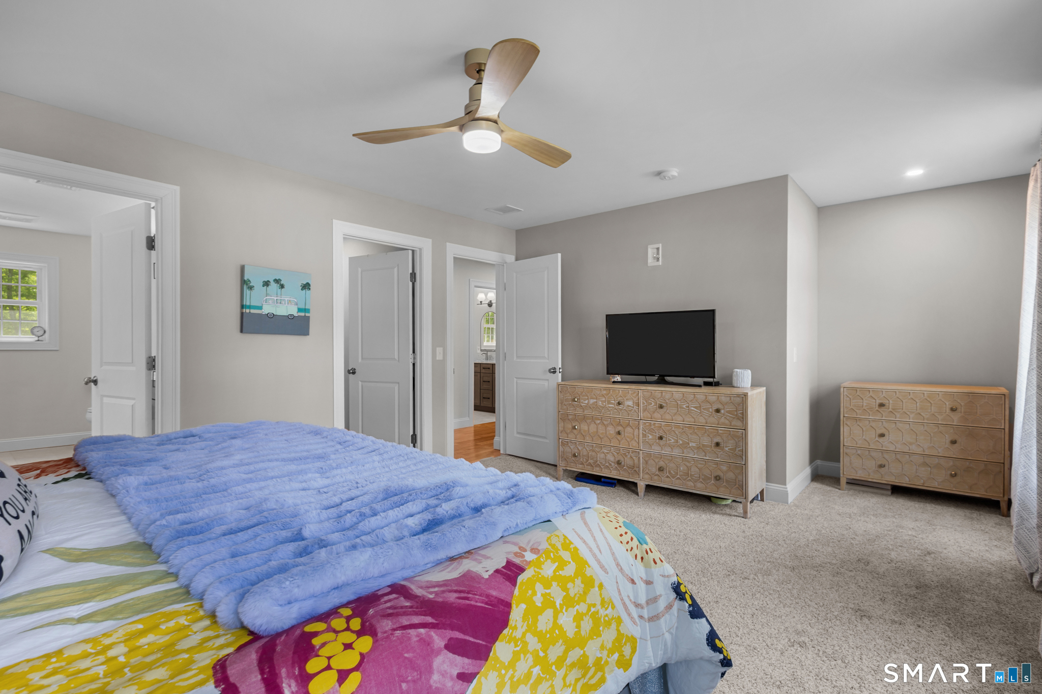 2 Martys Way Gales Ferry, CT 06335 - Photo 21 of 40 a bedroom with a bed and a flat screen tv
