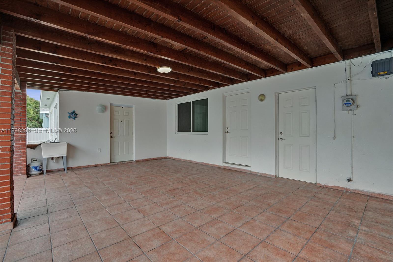 877 West 33rd Street Hialeah, FL 33012 - Photo 14 of 59 a view of an empty room