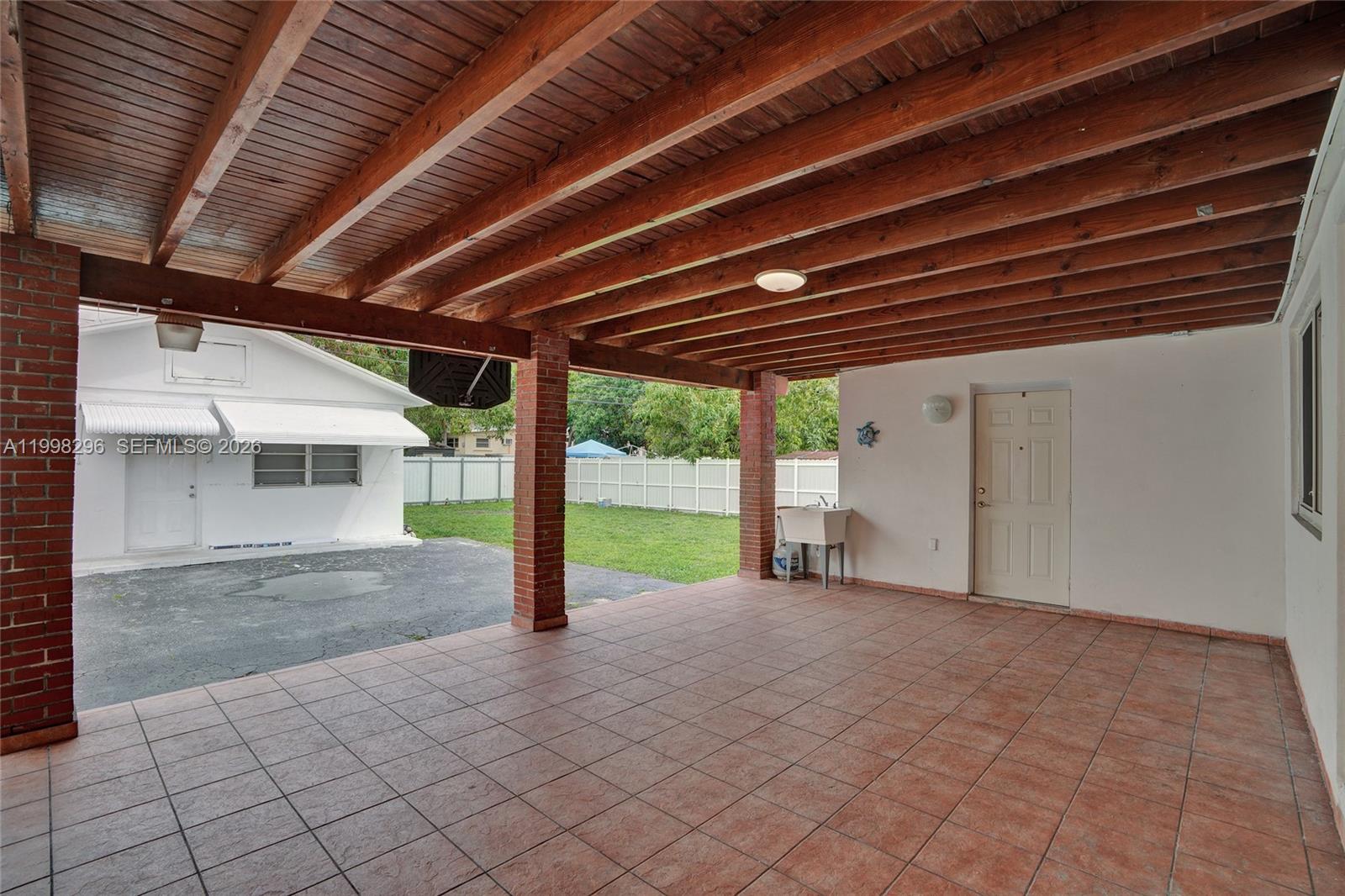 877 West 33rd Street Hialeah, FL 33012 - Photo 15 of 59 a view of a backyard of house