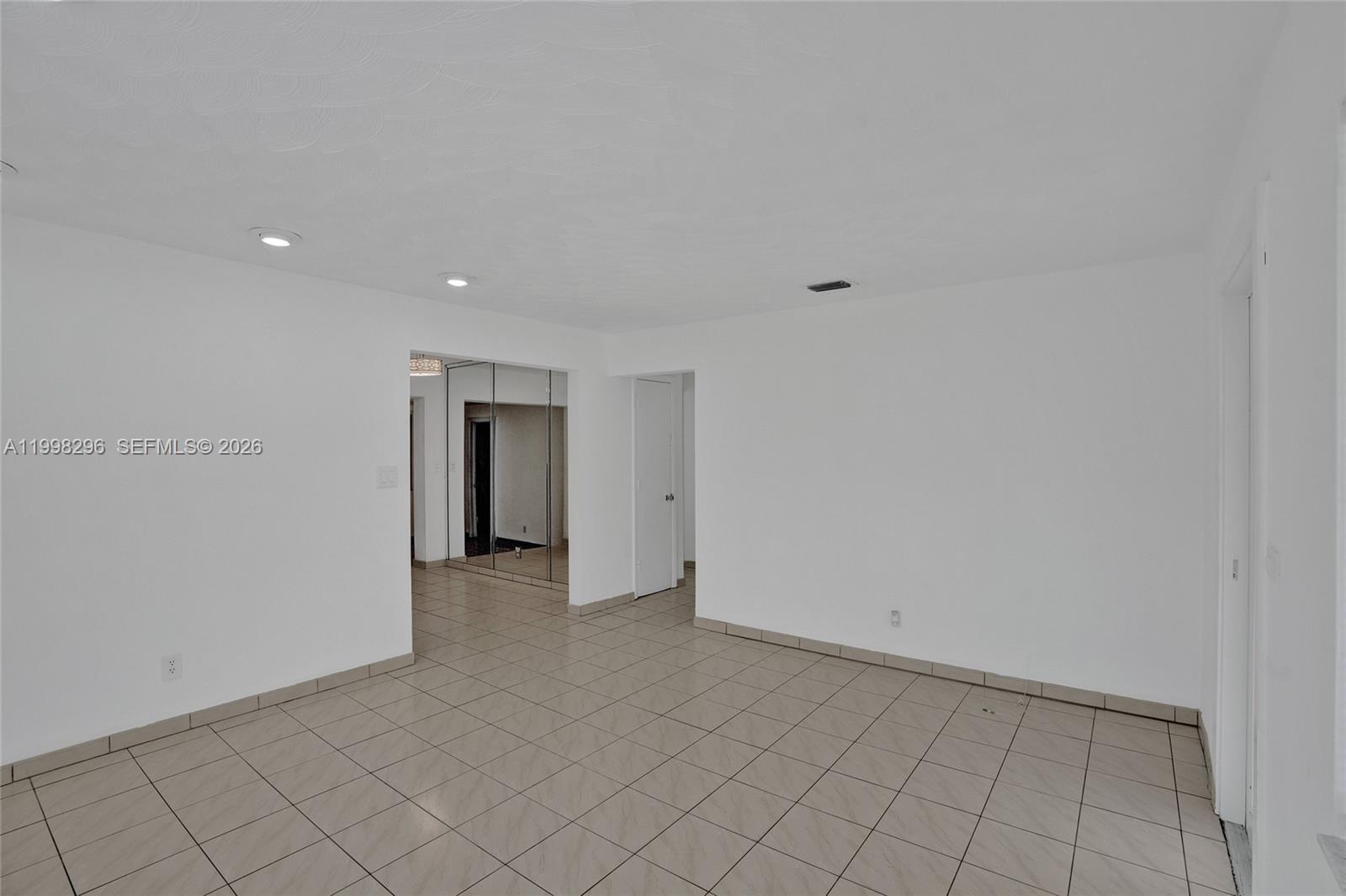 877 West 33rd Street Hialeah, FL 33012 - Photo 22 of 59 a view of an empty room