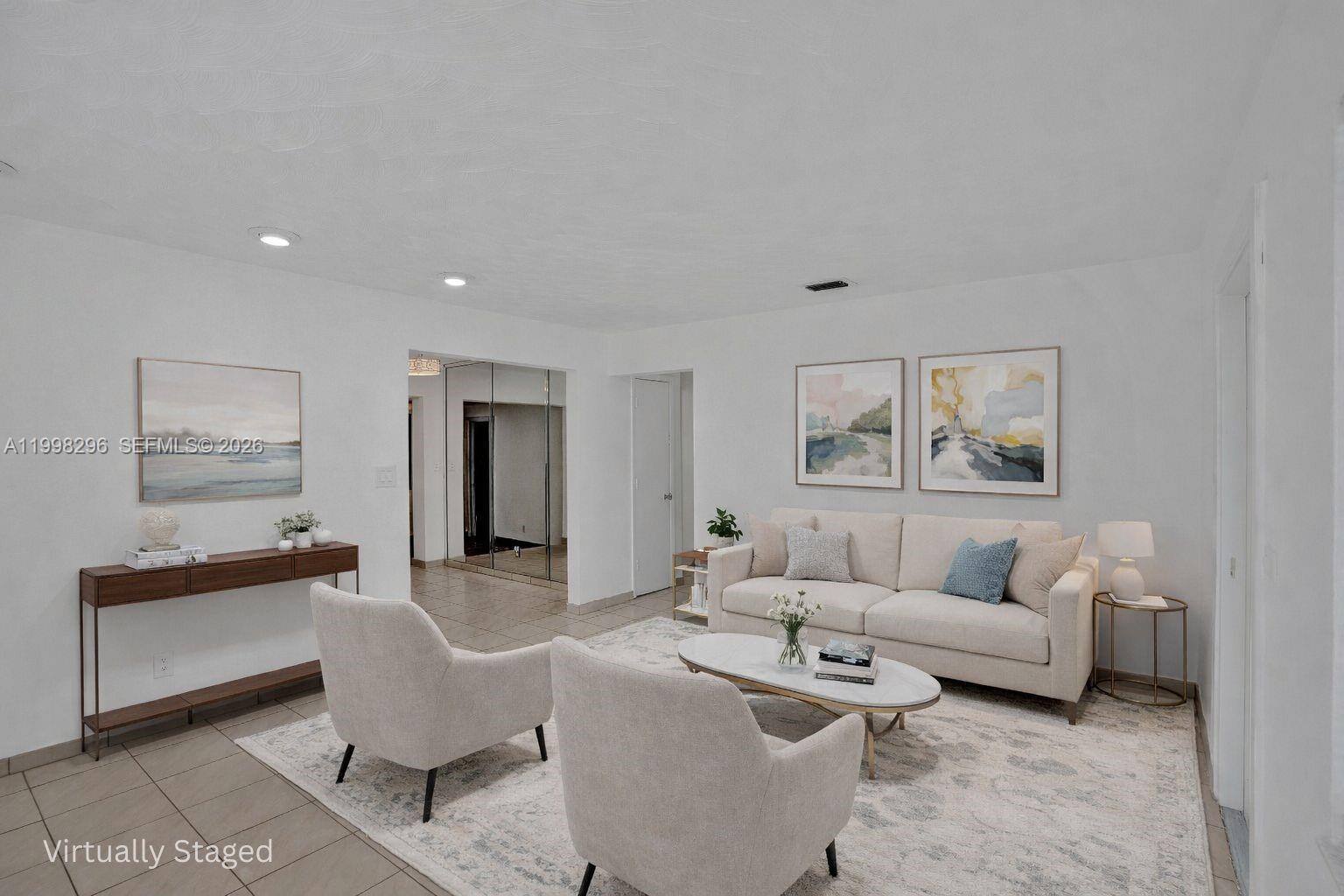 877 West 33rd Street Hialeah, FL 33012 - Photo 3 of 59 a living room with furniture and a window