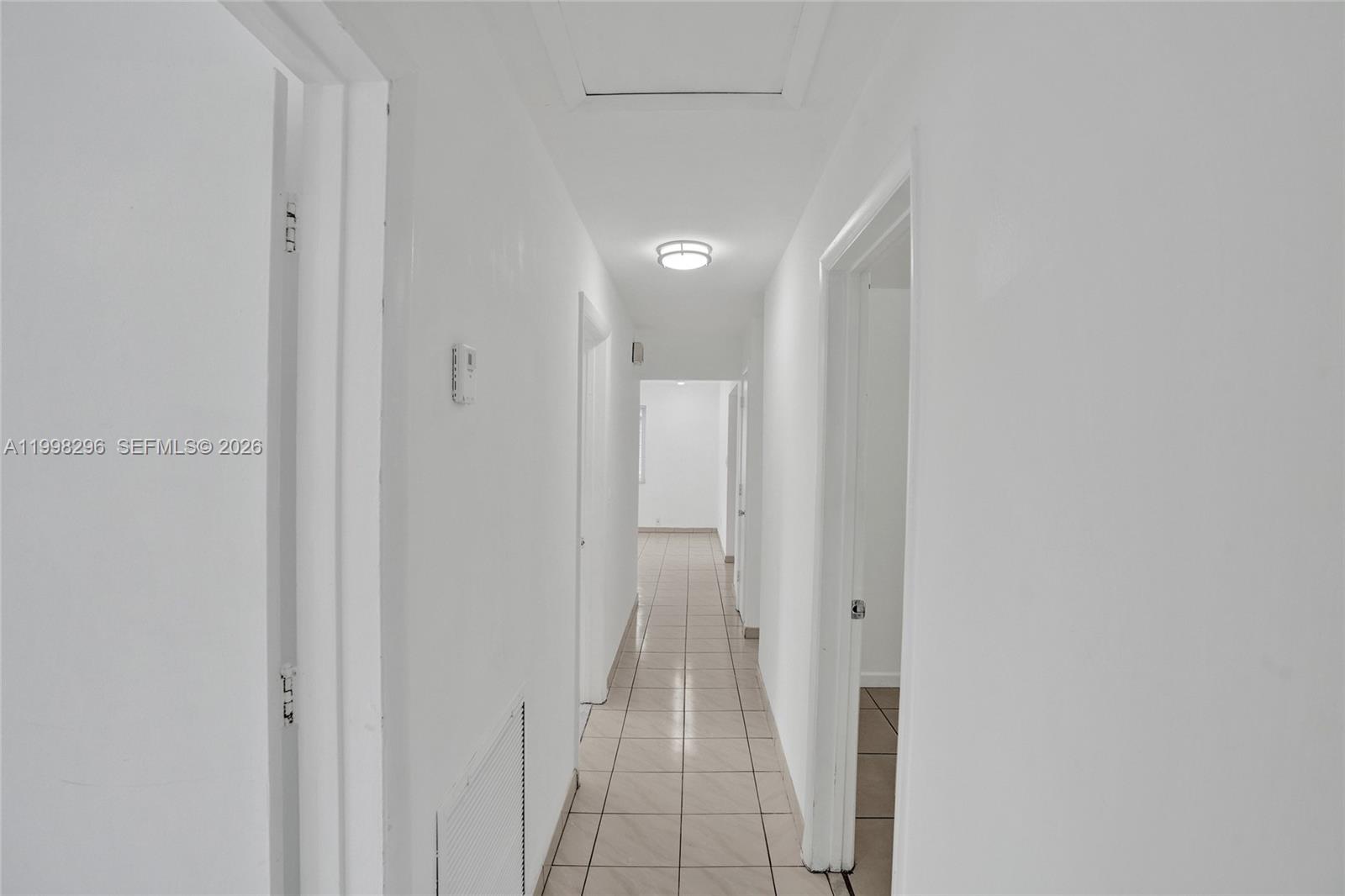 877 West 33rd Street Hialeah, FL 33012 - Photo 42 of 59 a view of a hallway