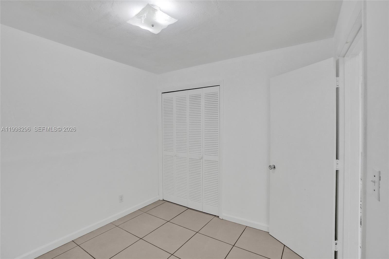 877 West 33rd Street Hialeah, FL 33012 - Photo 44 of 59 a view of an empty room