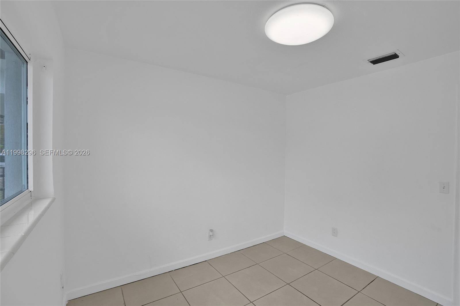 877 West 33rd Street Hialeah, FL 33012 - Photo 50 of 59 a view of empty room