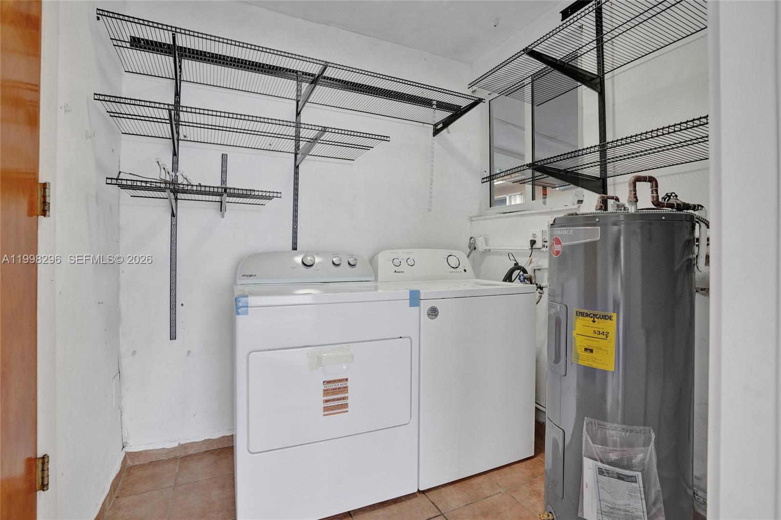 877 West 33rd Street Hialeah, FL 33012 - Photo 55 of 59 a utility room with dryer and washer