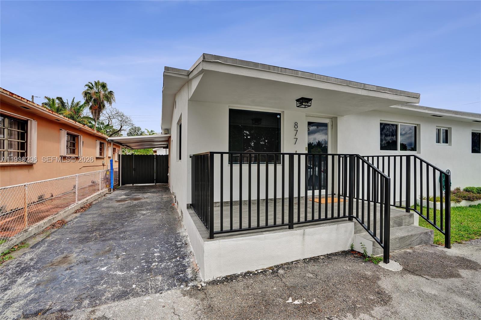 877 West 33rd Street Hialeah, FL 33012 - Photo 57 of 59 a view of a house with a yard