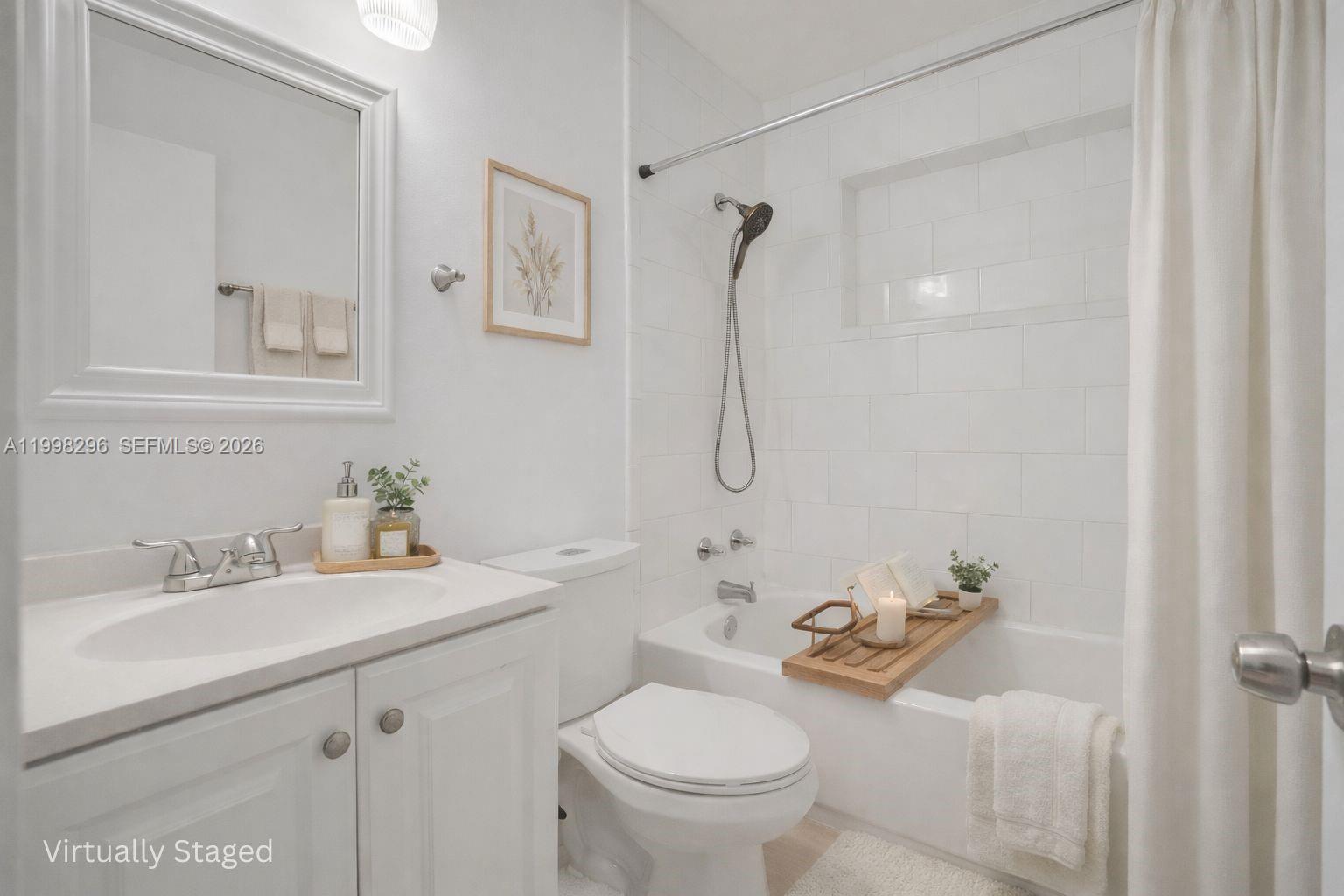 877 West 33rd Street Hialeah, FL 33012 - Photo 8 of 59 a bathroom with a sink toilet and shower