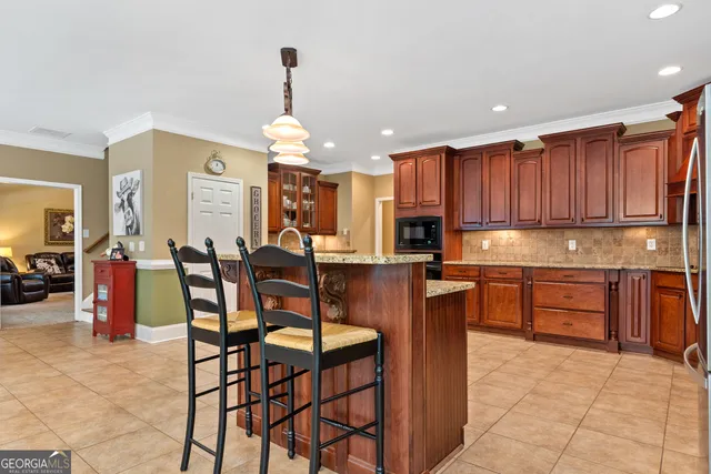 a spacious bathroom with a double vanity sink and a mirror