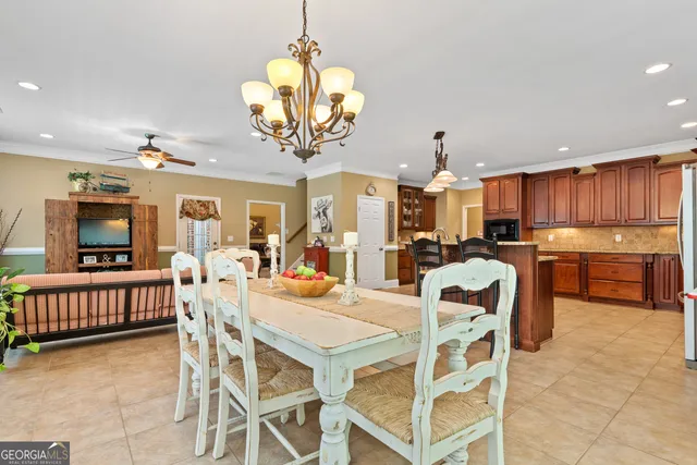 a spacious bathroom with a double vanity sink a mirror and a shower