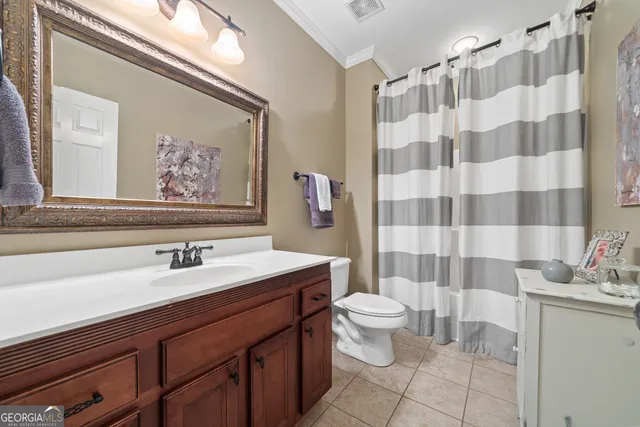 a balcony with trees in front of it