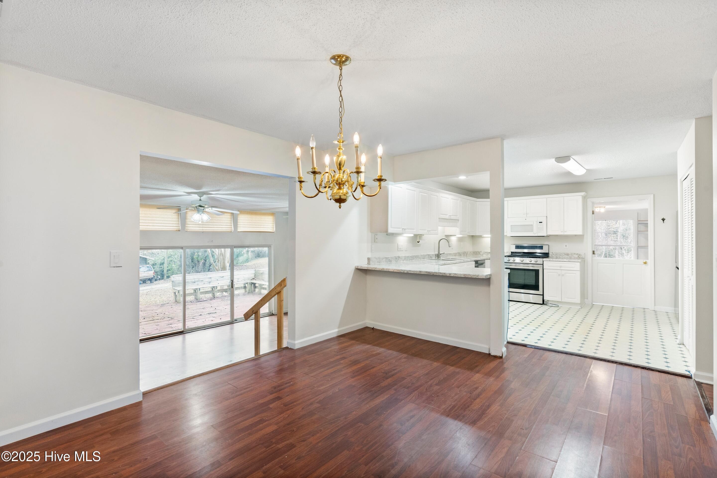 278 Batson Road Hampstead, NC 28443 - Photo 13 of 54 Dining Room/Kitchen/Family Room