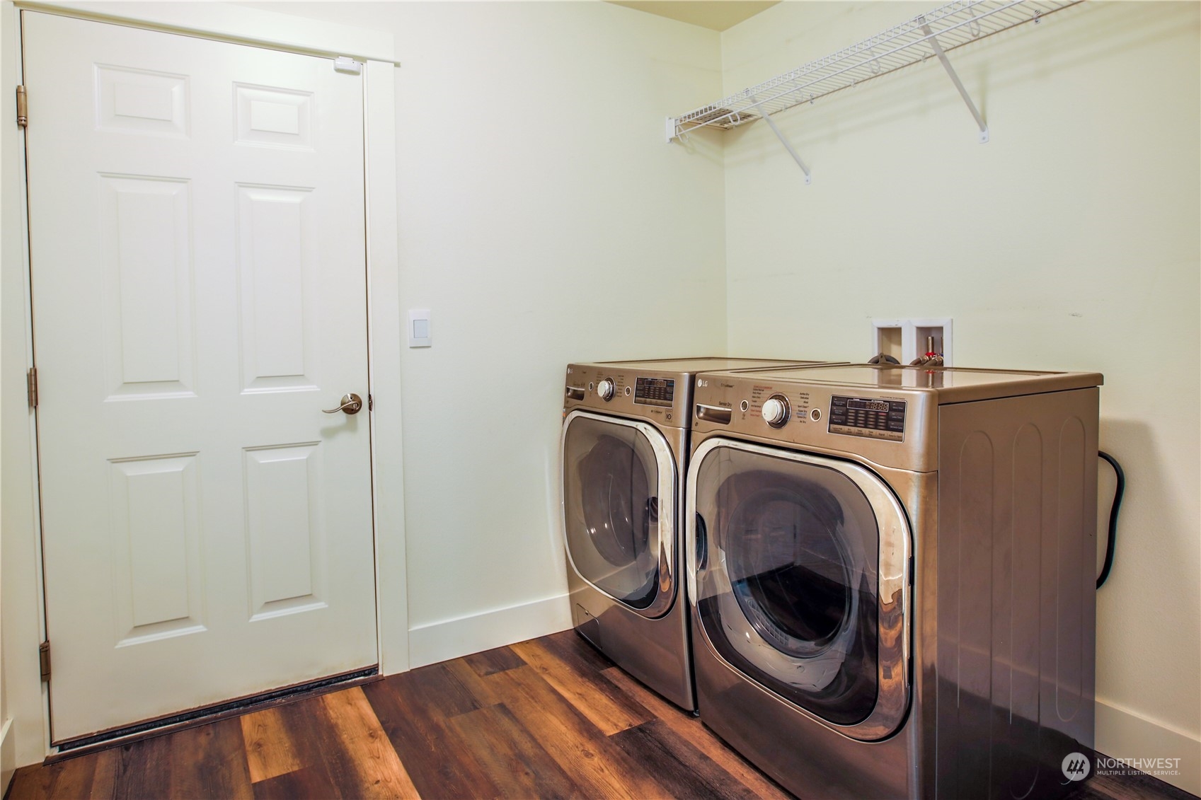 3867 East Harbor Road Langley, WA 98260 - Photo 18 of 39 a utility room with dryer and washer