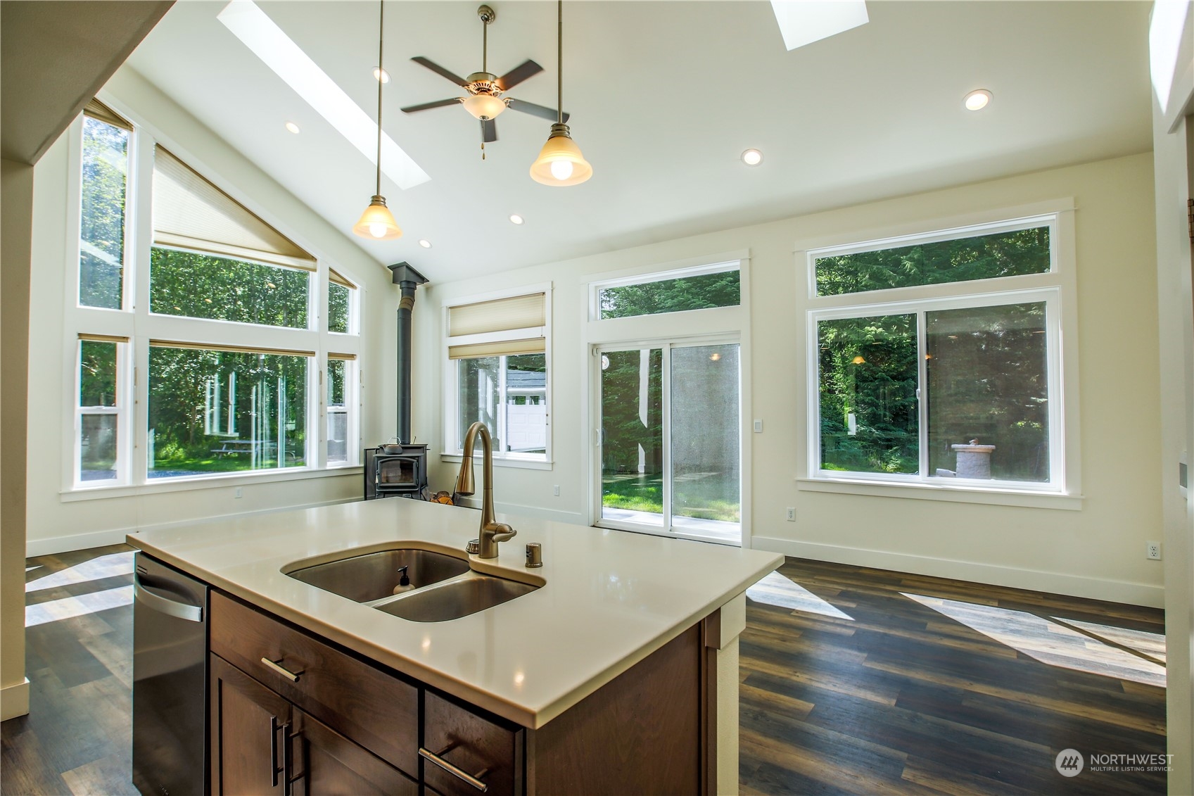 3867 East Harbor Road Langley, WA 98260 - Photo 6 of 39 a kitchen with a sink a counter space and a window