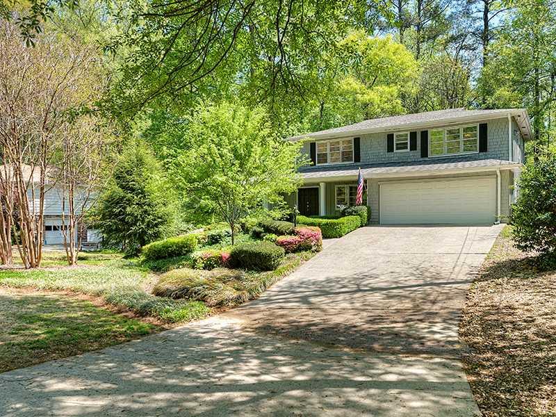 6725 Ridge Mill Lane Northeast Sandy Springs, GA 30328 - Photo 1 of 1 Exterior Front. Immaculate traditional home with irrigation system. Walk to new Abernathy Park, swim/tennis available, close in Sandy Springs location. Very private lot.