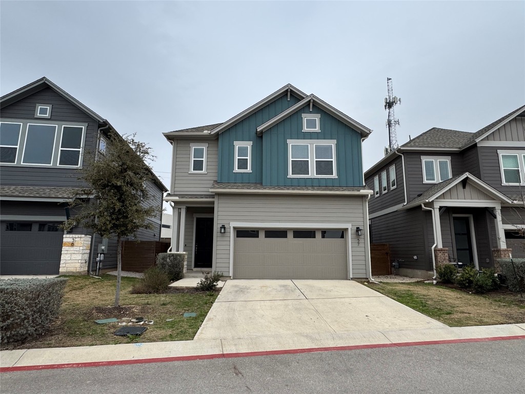 3000 Chisholm Trail Road, Unit 57 Round Rock, TX 78681 - Photo 1 of 31 a front view of a house with a yard and garage