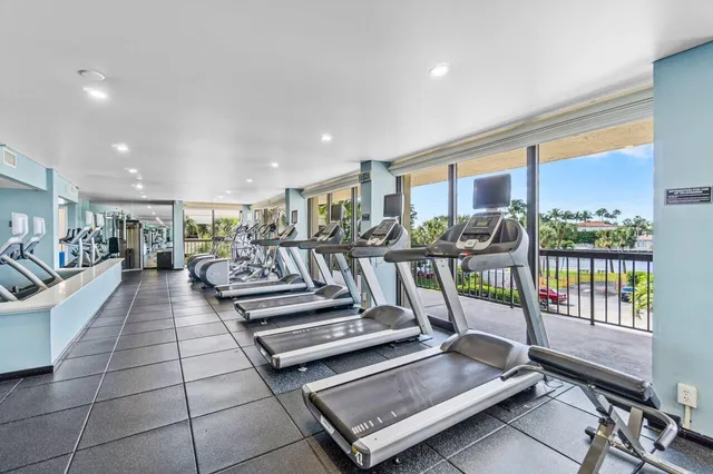 a view of a living room and balcony
