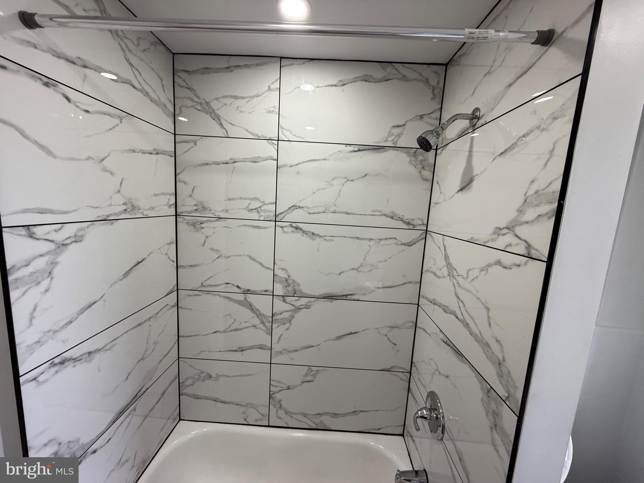 607 Littlecroft Road Upper Darby, PA 19082 - Photo 17 of 34 a bathroom with a shower