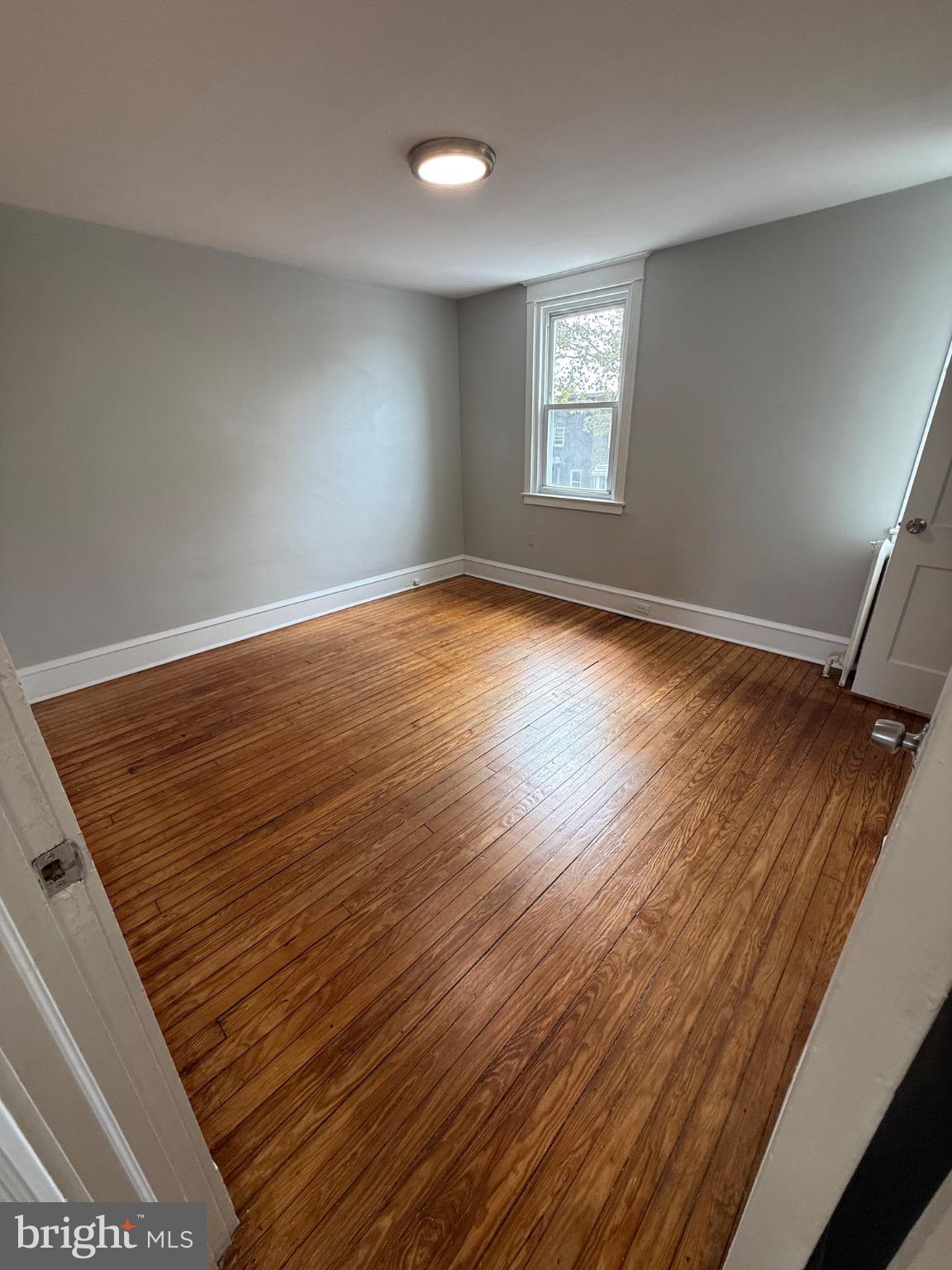 607 Littlecroft Road Upper Darby, PA 19082 - Photo 19 of 34 wooden floor in an empty room