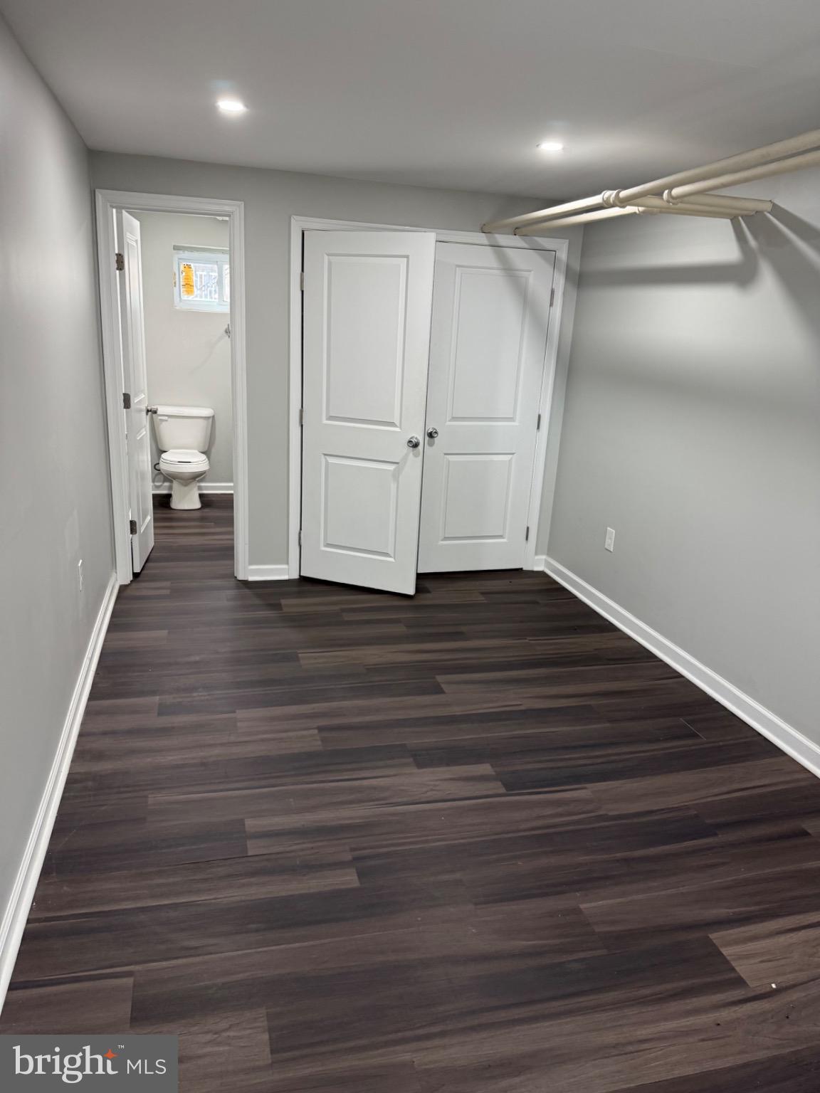 607 Littlecroft Road Upper Darby, PA 19082 - Photo 23 of 34 a view of a room with wooden floor and white walls