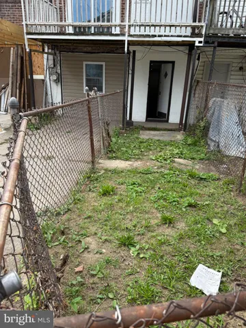 a front view of a building with glass windows