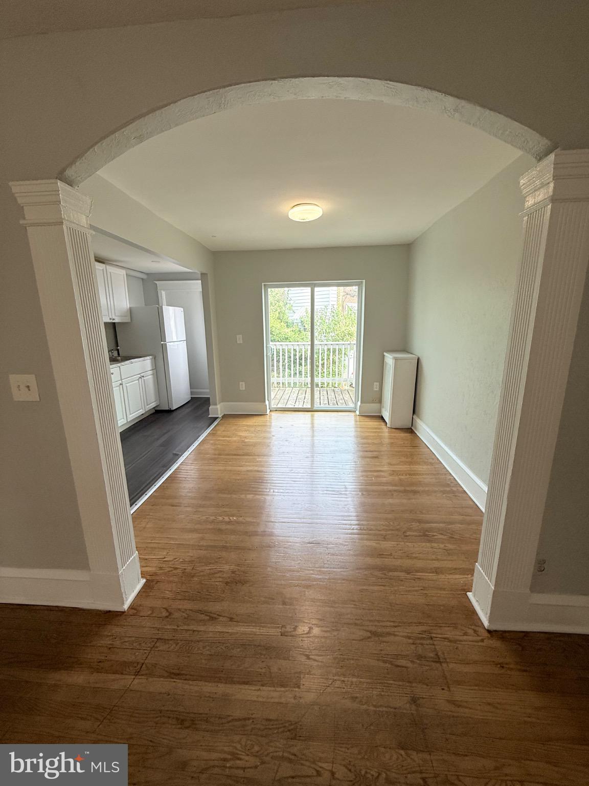607 Littlecroft Road Upper Darby, PA 19082 - Photo 6 of 34 a view of empty room with wooden floor and fan