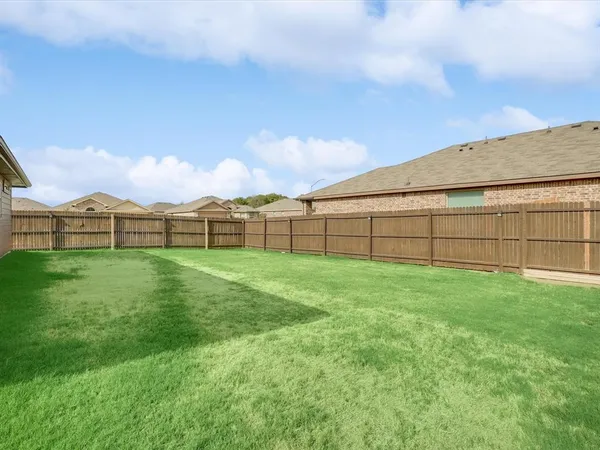 a view of outdoor space with a garden