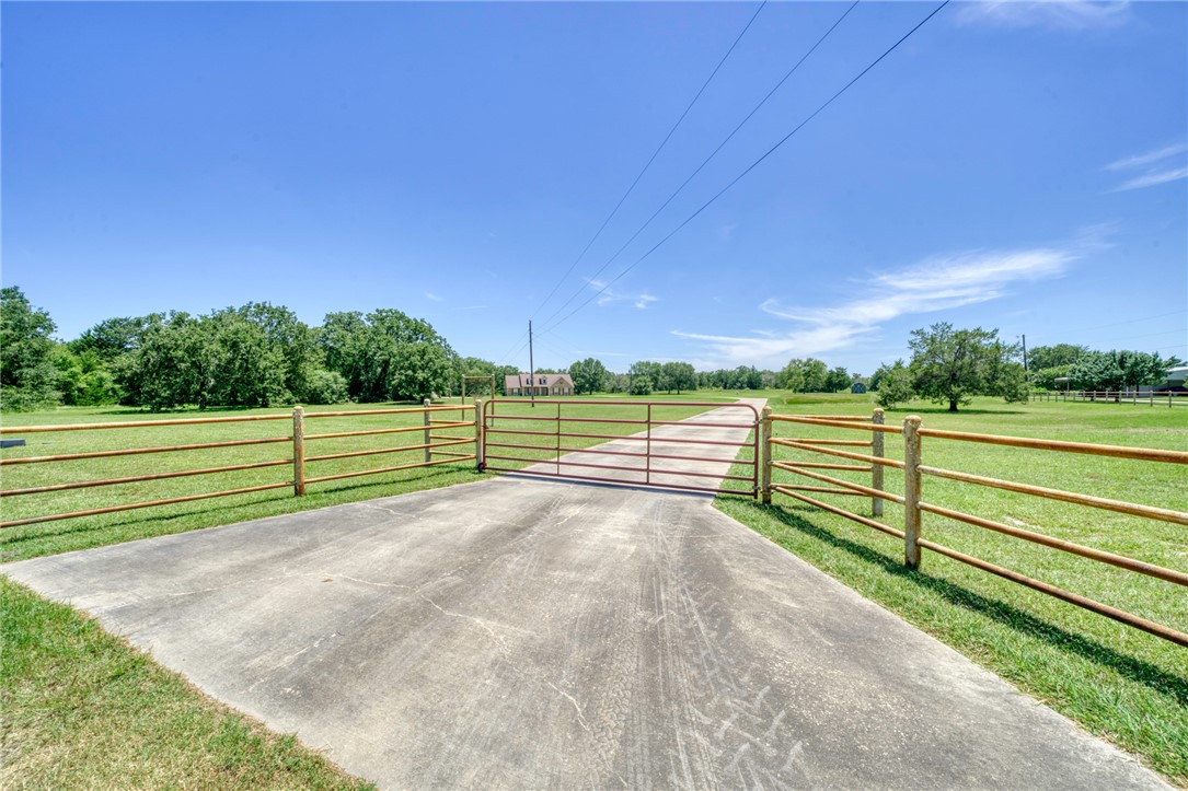 9945 Oxford Cemetery Road Madisonville, TX 77864 - Photo 2 of 42 Gate with a view of rural / pastoral area and a lawn