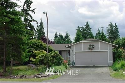 2226 240th Place Southeast Bothell, WA 98021 - Photo 1 of 1 a front view of a house with garden