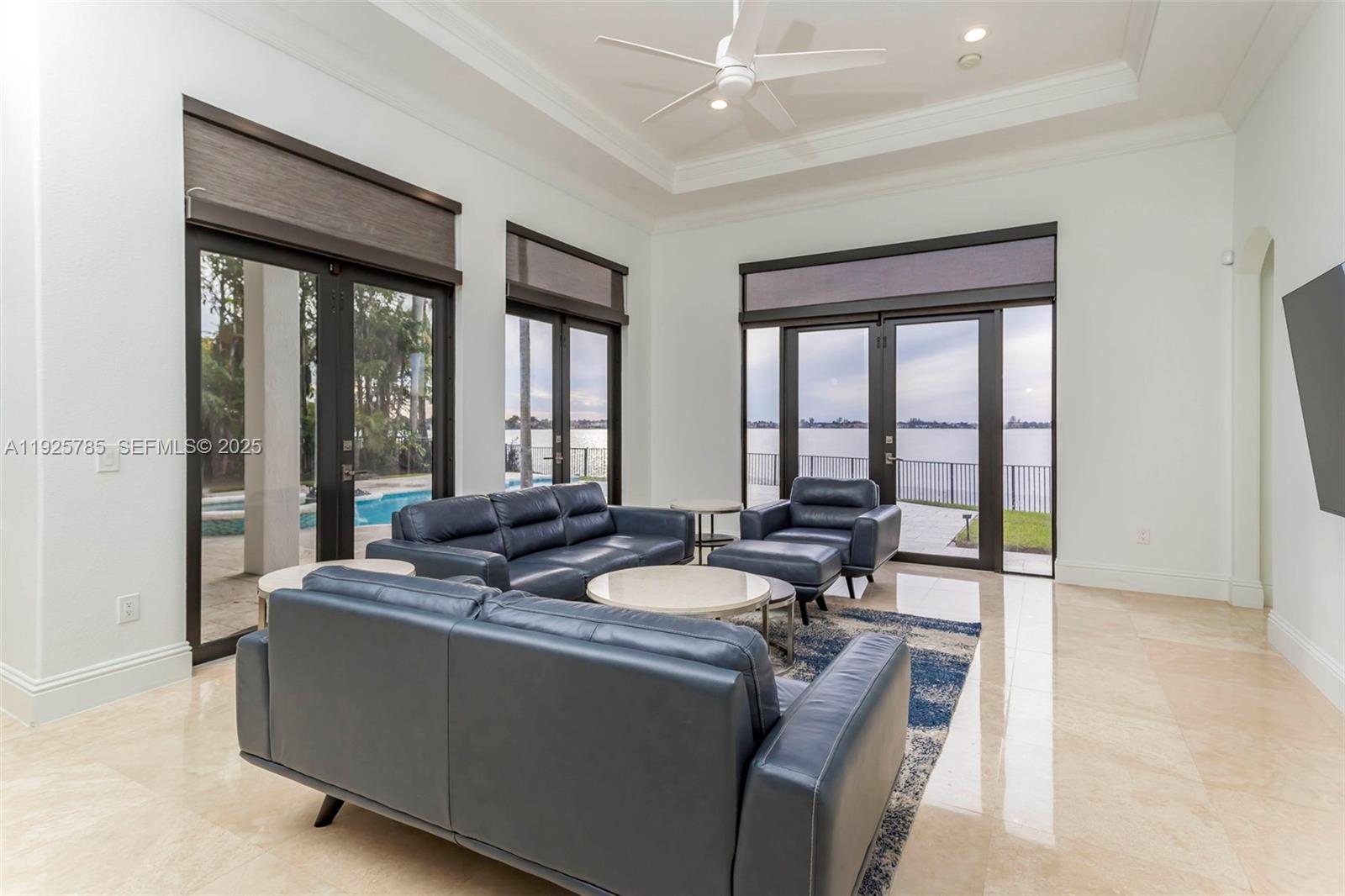 1962 Southwest 185th Avenue Miramar, FL 33029 - Photo 12 of 55 a living room with furniture and large windows