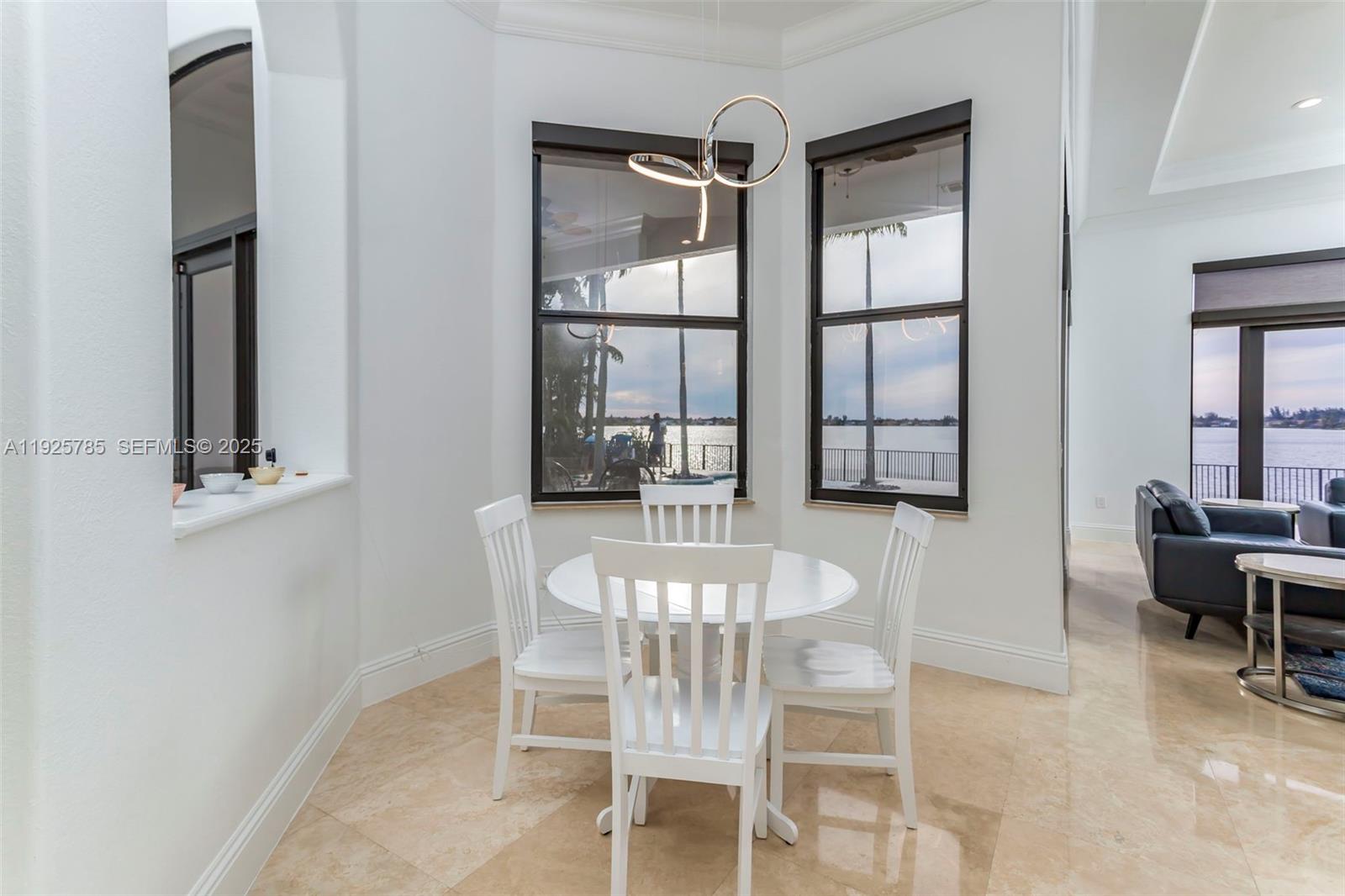 1962 Southwest 185th Avenue Miramar, FL 33029 - Photo 14 of 55 a view of a dining room with furniture and window