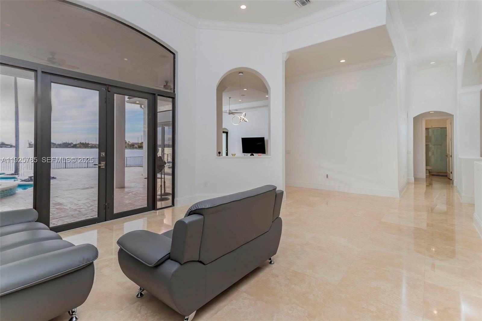 1962 Southwest 185th Avenue Miramar, FL 33029 - Photo 17 of 55 a living room with furniture and a large window