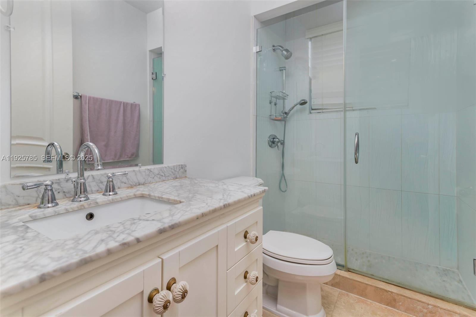 1962 Southwest 185th Avenue Miramar, FL 33029 - Photo 31 of 55 a bathroom with a granite countertop sink toilet and shower