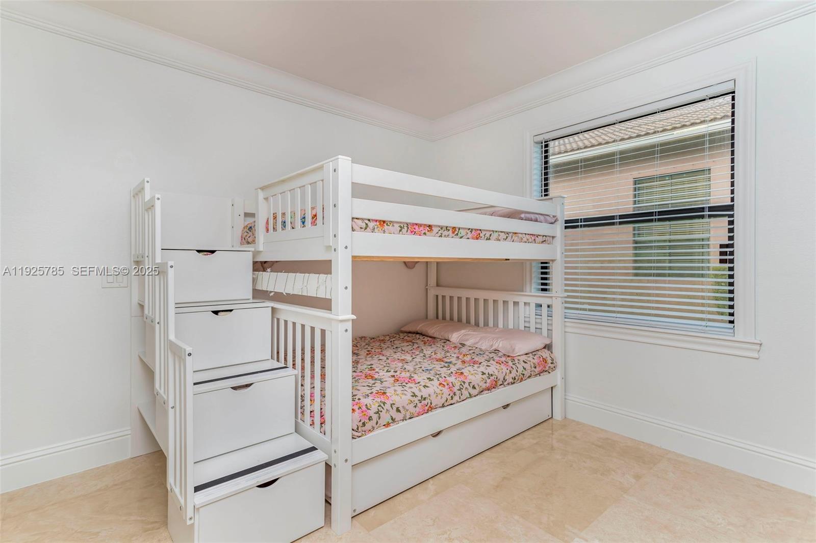 1962 Southwest 185th Avenue Miramar, FL 33029 - Photo 32 of 55 a bedroom with a bed and a window