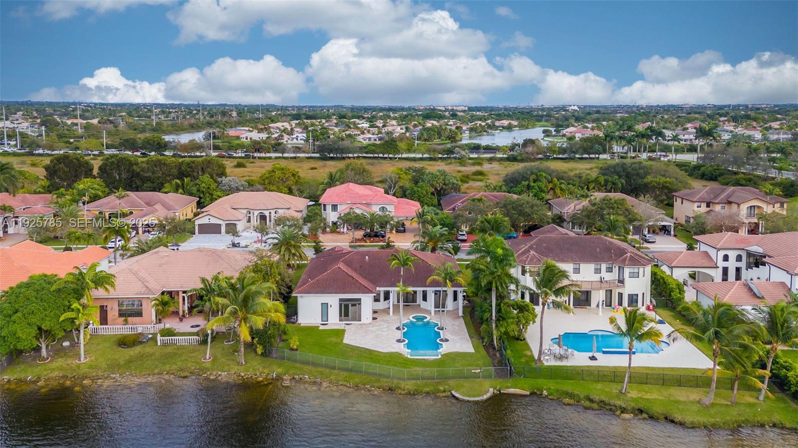 1962 Southwest 185th Avenue Miramar, FL 33029 - Photo 45 of 55 an aerial view of residential houses with outdoor space and swimming pool