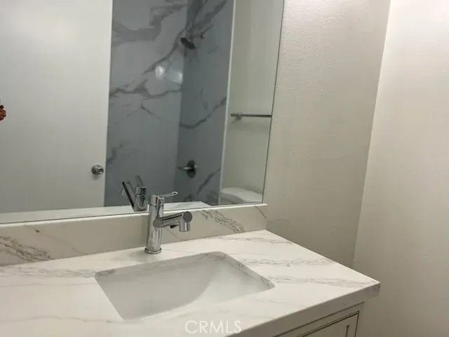 a bathroom with a sink and a bathtub