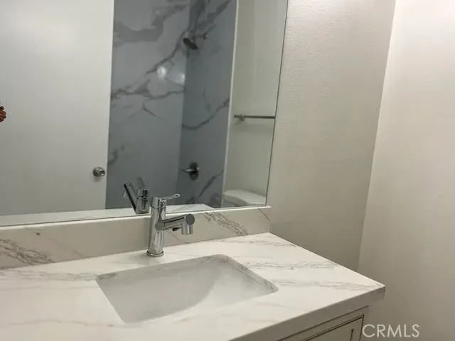a bathroom with a sink and a bathtub