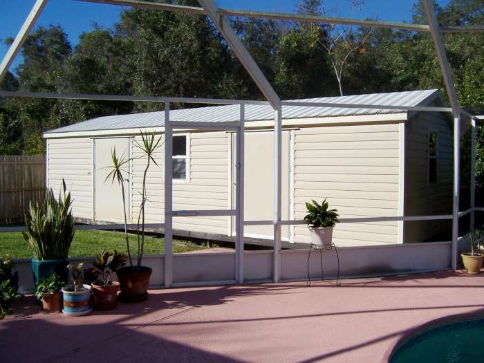516 Moultrie Wells Road St. Augustine, FL 32086 - Photo 18 of 18 a side view of a house with a outdoor space
