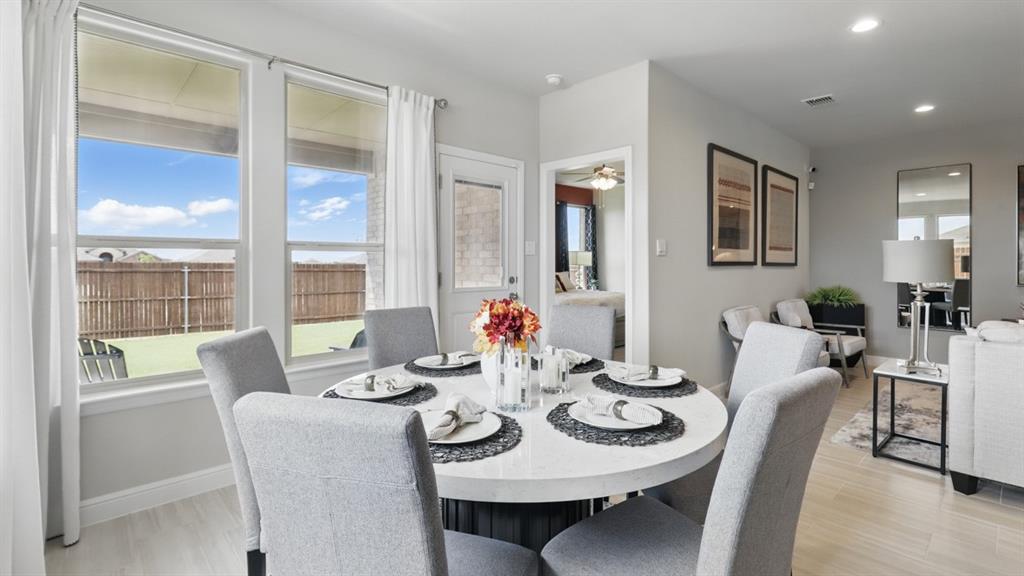 1922 Jackson Street Cleburne, TX 76033 - Photo 7 of 39 a view of a dining room with furniture window and outside view