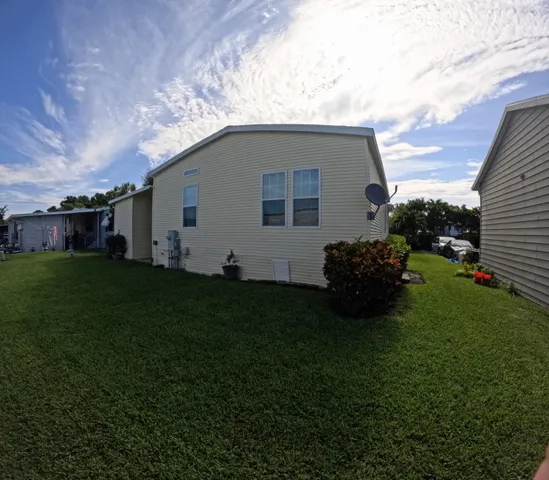a house view with a garden space